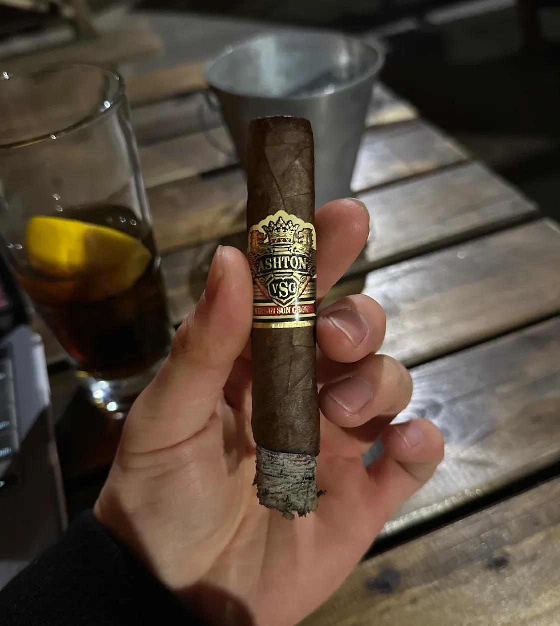 Cigar tasting setup in lounge lighting